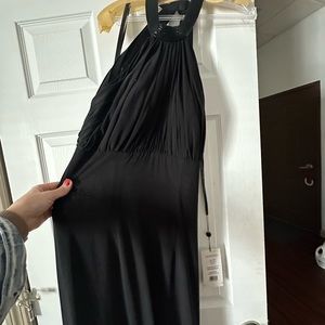 Black size 12 Sherri hill dress that’s never been worn with tags on